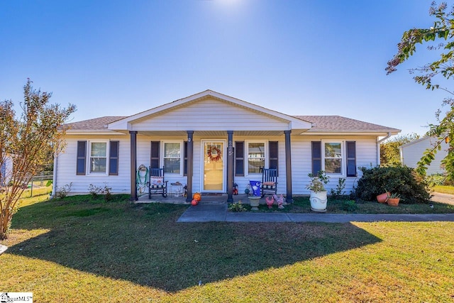 single story home featuring a porch and a front lawn