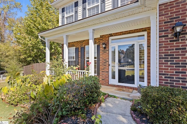 entrance to property with covered porch