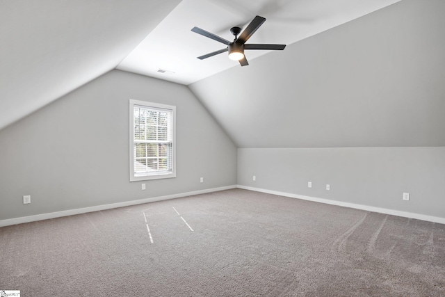 bonus room with carpet, vaulted ceiling, and ceiling fan