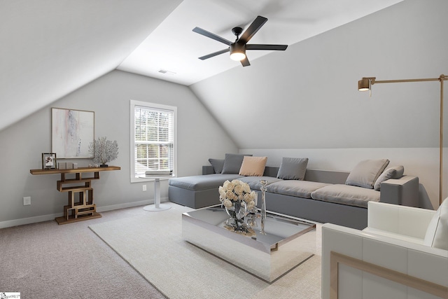 carpeted living room with lofted ceiling and ceiling fan