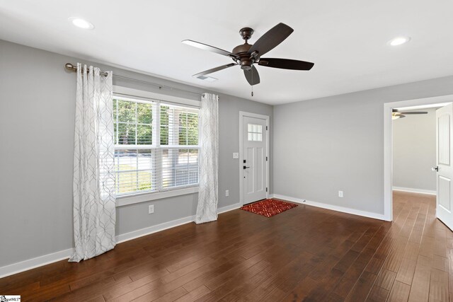 entrance foyer with ceiling fan and dark hardwood / wood-style flooring