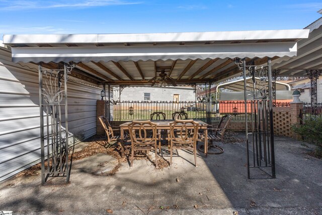 view of patio with ceiling fan