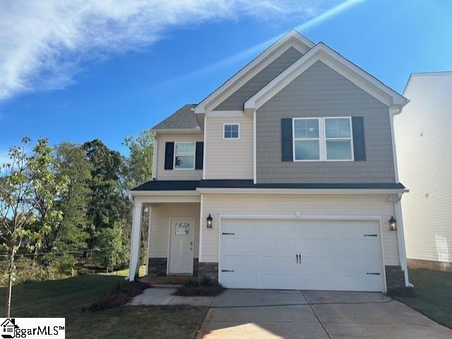 view of front of home with a garage