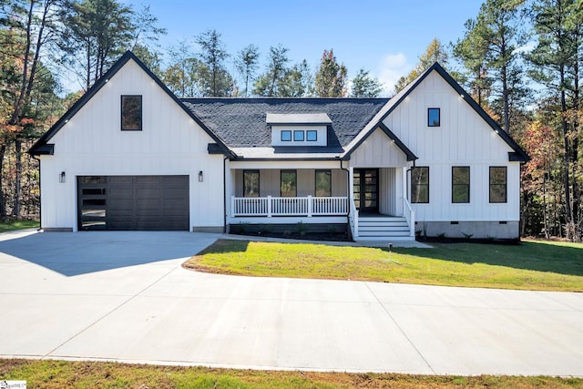 modern inspired farmhouse with a front yard