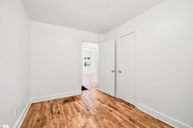 unfurnished bedroom featuring light hardwood / wood-style floors