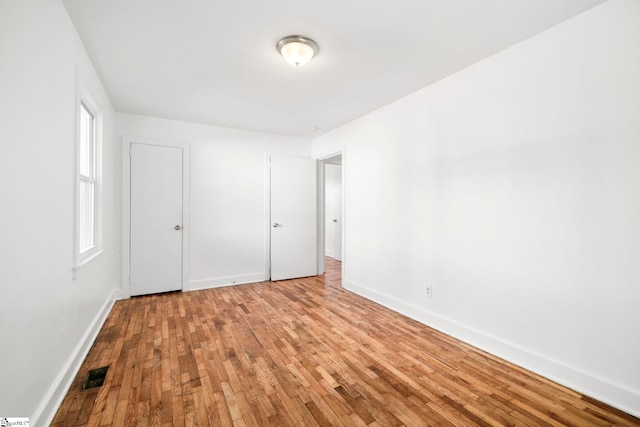 unfurnished bedroom with light hardwood / wood-style flooring