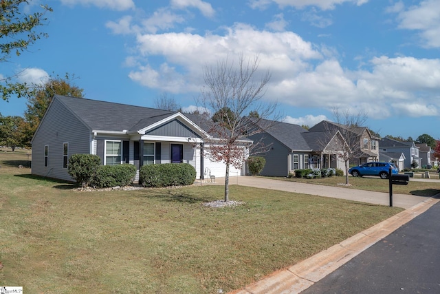 ranch-style home featuring a front yard and a garage