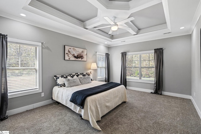 carpeted bedroom with multiple windows, coffered ceiling, crown molding, and ceiling fan