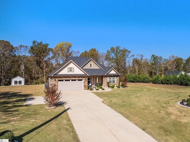 view of front of home with a front lawn and a garage