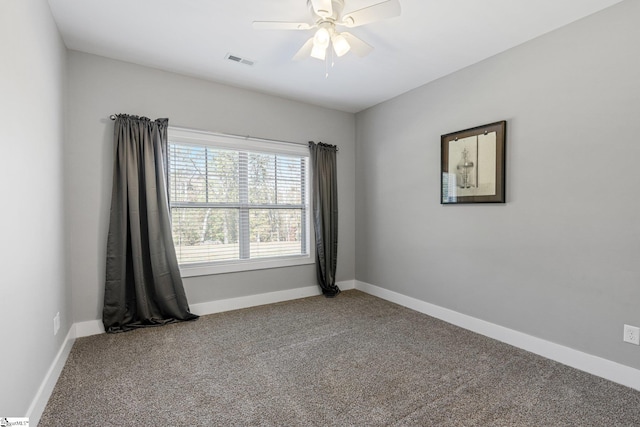 unfurnished room with carpet floors and ceiling fan