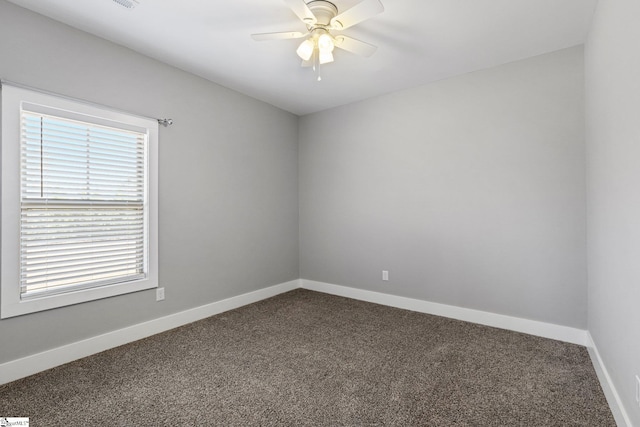 carpeted empty room with ceiling fan