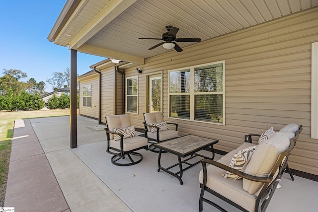 view of patio / terrace featuring ceiling fan