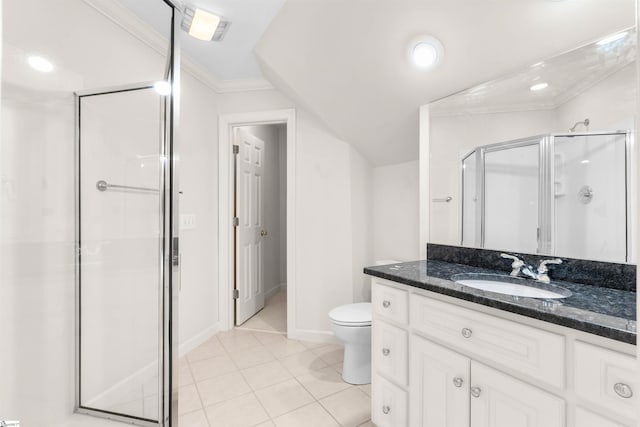 bathroom with a shower with door, toilet, vanity, crown molding, and tile patterned flooring