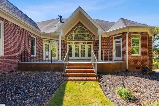 back of property featuring french doors