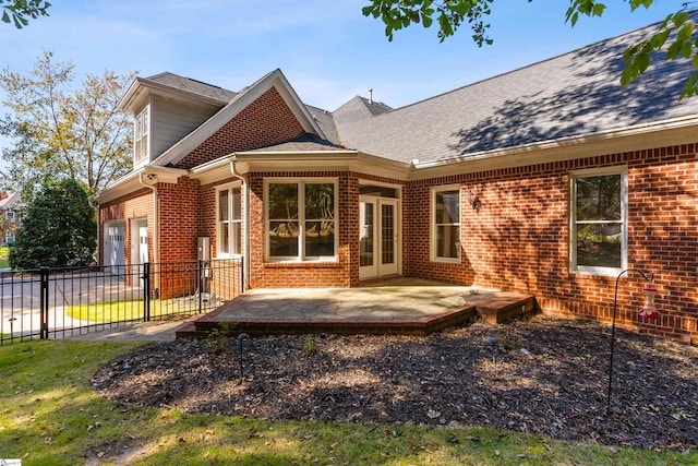 back of property with a patio area