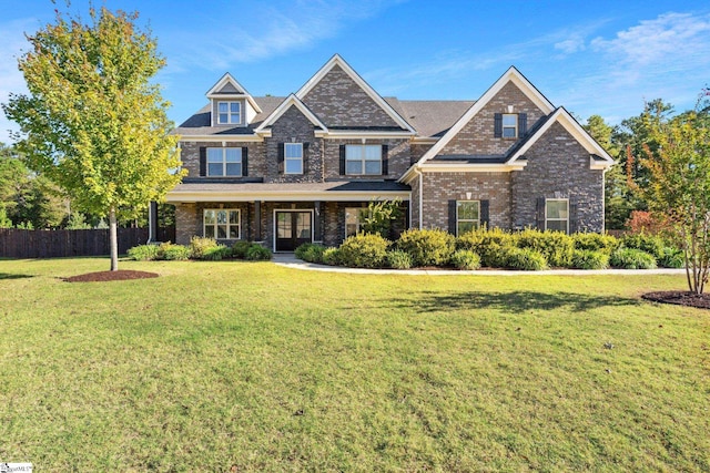 craftsman house featuring a front yard