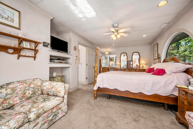 carpeted bedroom featuring ceiling fan, crown molding, and multiple windows