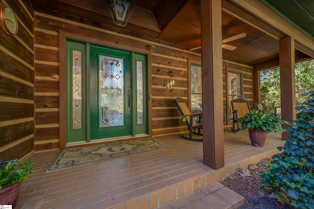 property entrance featuring a porch