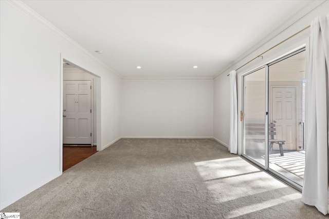 carpeted empty room with crown molding