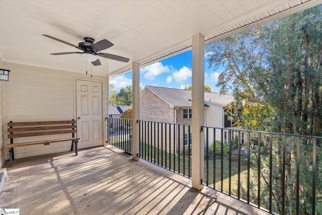 exterior space with ceiling fan