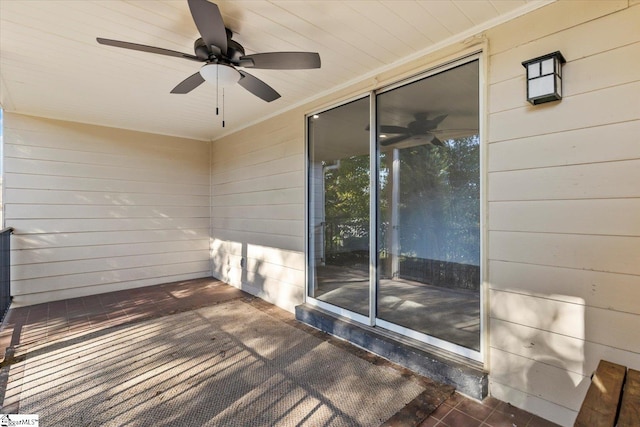 wooden terrace featuring ceiling fan