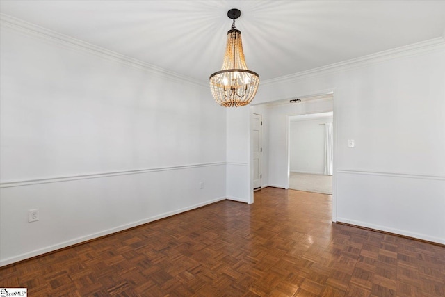 empty room featuring ornamental molding, an inviting chandelier, and dark parquet flooring