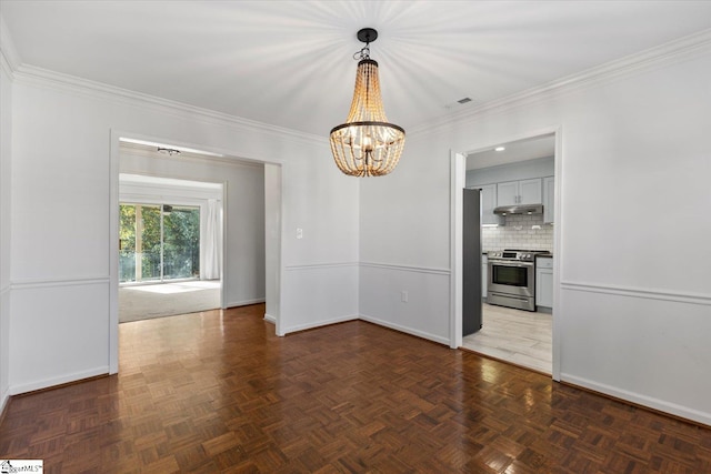 unfurnished dining area featuring a notable chandelier, dark parquet floors, and crown molding