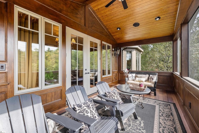 sunroom / solarium with french doors, wood ceiling, lofted ceiling, and ceiling fan