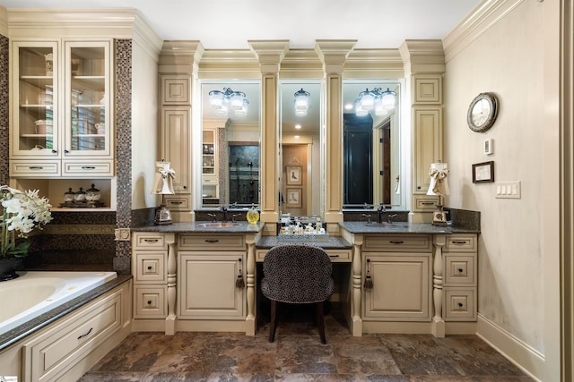 bathroom featuring vanity, a tub, and ornamental molding