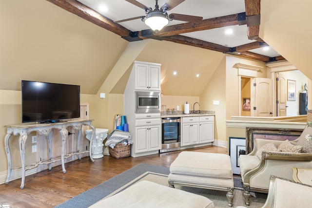 living room with beverage cooler, ceiling fan, dark hardwood / wood-style flooring, lofted ceiling with beams, and sink