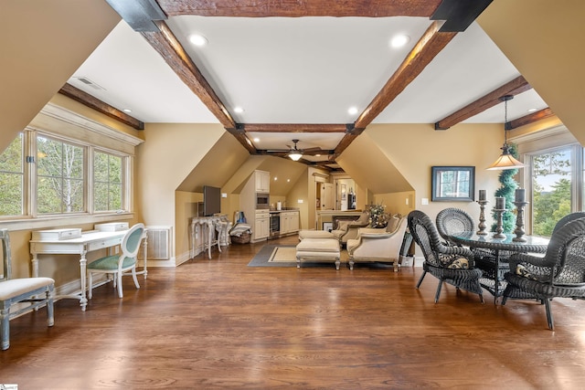 interior space featuring ceiling fan, lofted ceiling with beams, dark wood-type flooring, and a wealth of natural light