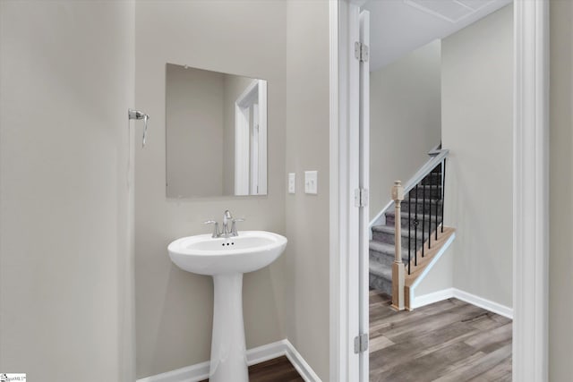 bathroom featuring sink and hardwood / wood-style floors