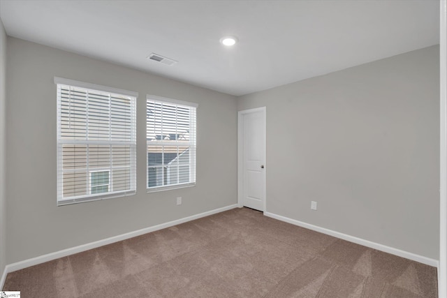 unfurnished room featuring carpet floors