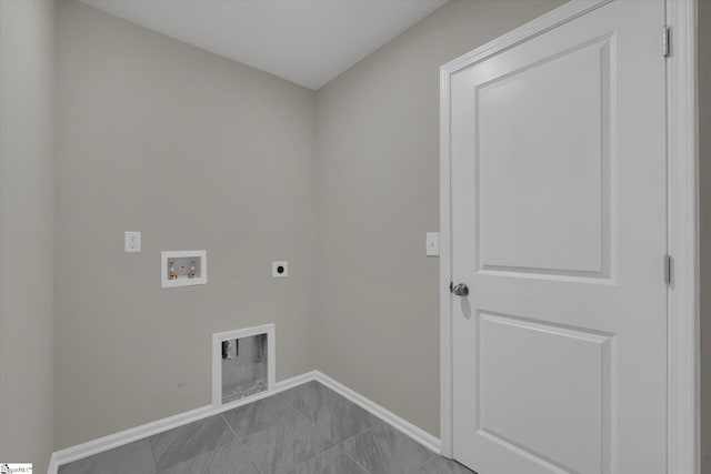 washroom featuring light tile patterned flooring, electric dryer hookup, and washer hookup