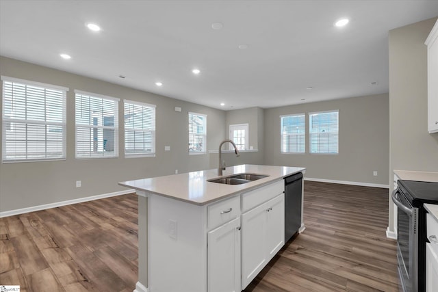 kitchen with white cabinetry, sink, a center island with sink, and dark hardwood / wood-style flooring