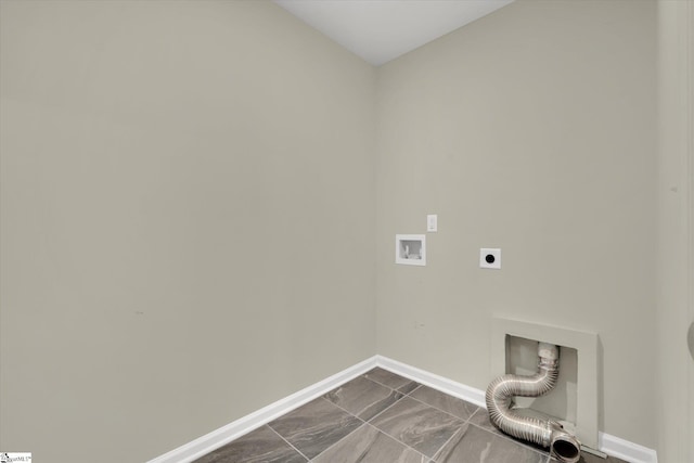 clothes washing area featuring electric dryer hookup, washer hookup, and tile patterned flooring