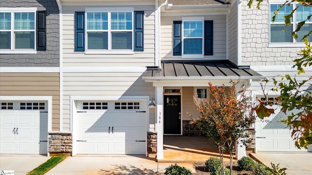 view of front of home with a garage