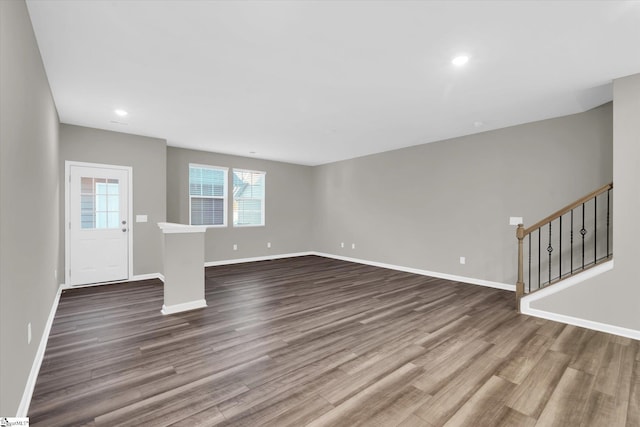 unfurnished living room with hardwood / wood-style floors