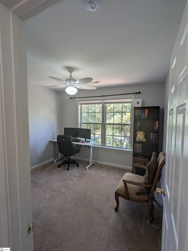 office area featuring carpet floors and ceiling fan