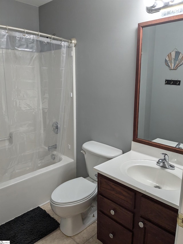 full bathroom with tile patterned flooring, vanity, toilet, and shower / tub combo