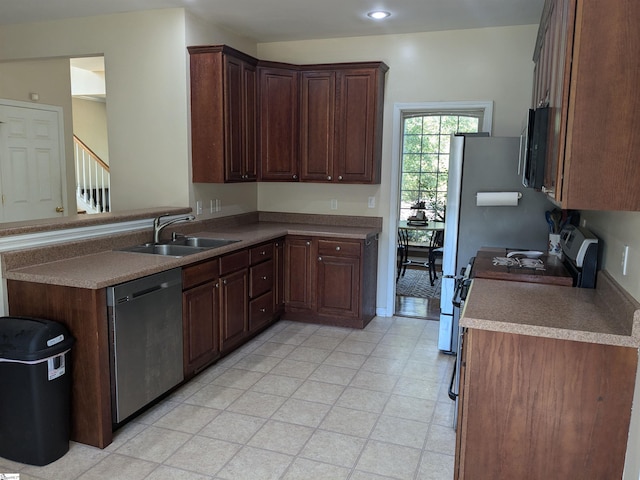 kitchen featuring appliances with stainless steel finishes and sink