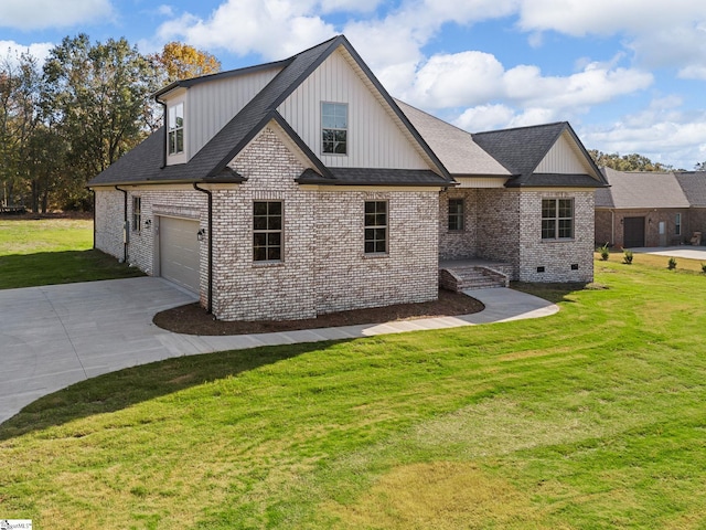 view of front facade with a front lawn and a garage