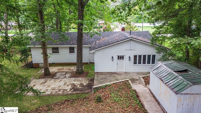 back of house with a patio area