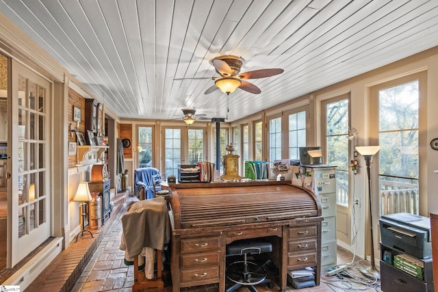 office space featuring ceiling fan and wooden ceiling