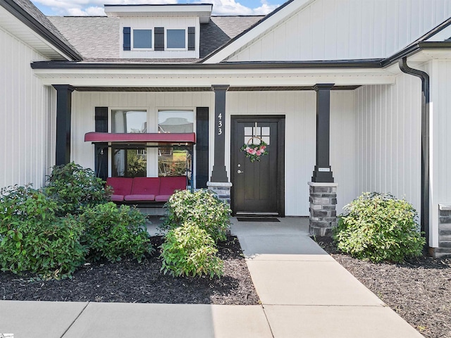 entrance to property with a porch