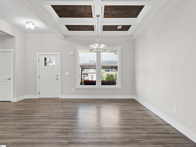 entryway with coffered ceiling, beamed ceiling, dark hardwood / wood-style flooring, and a chandelier