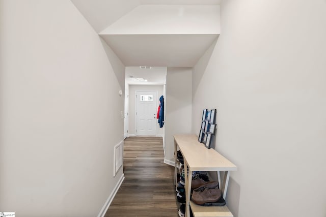 hall with dark hardwood / wood-style flooring