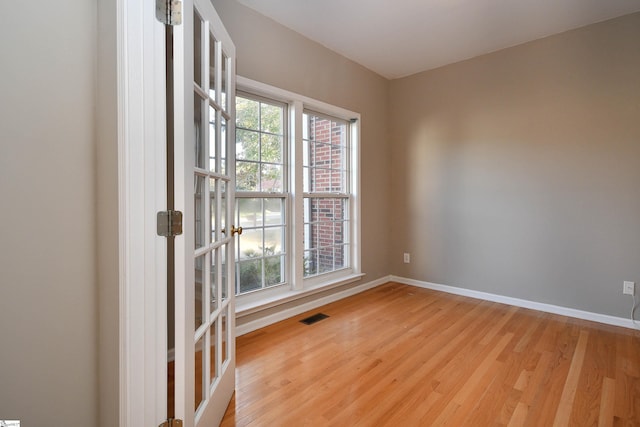 empty room featuring light hardwood / wood-style floors