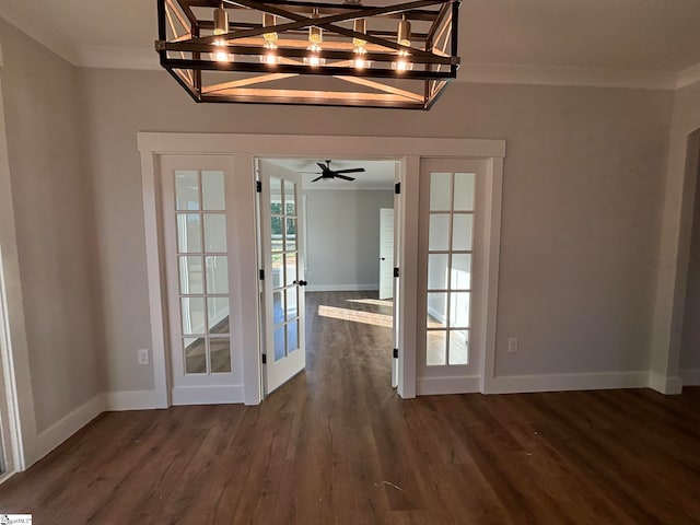 entryway featuring french doors, ornamental molding, and dark hardwood / wood-style flooring