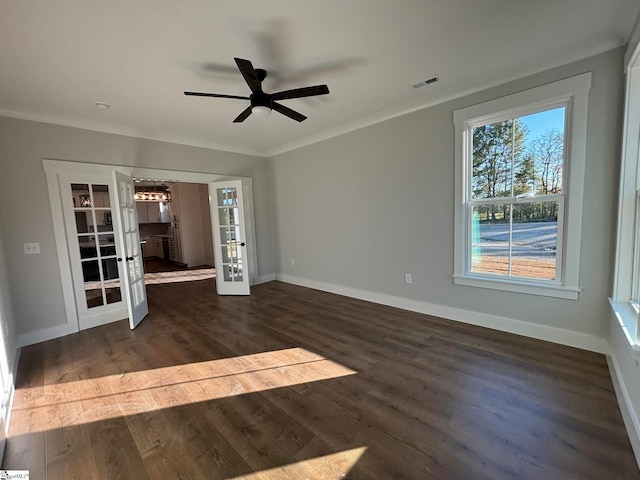 unfurnished living room with french doors, ceiling fan, crown molding, and dark hardwood / wood-style floors